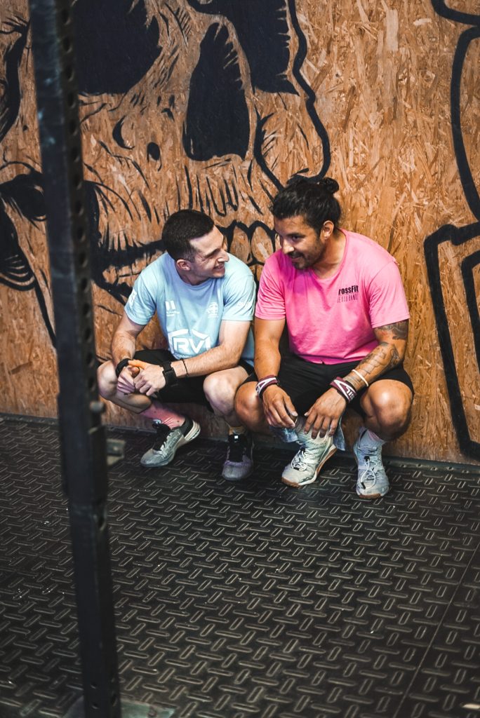 CrossFit Puerto Banús athletes sharing a moment inside the gym